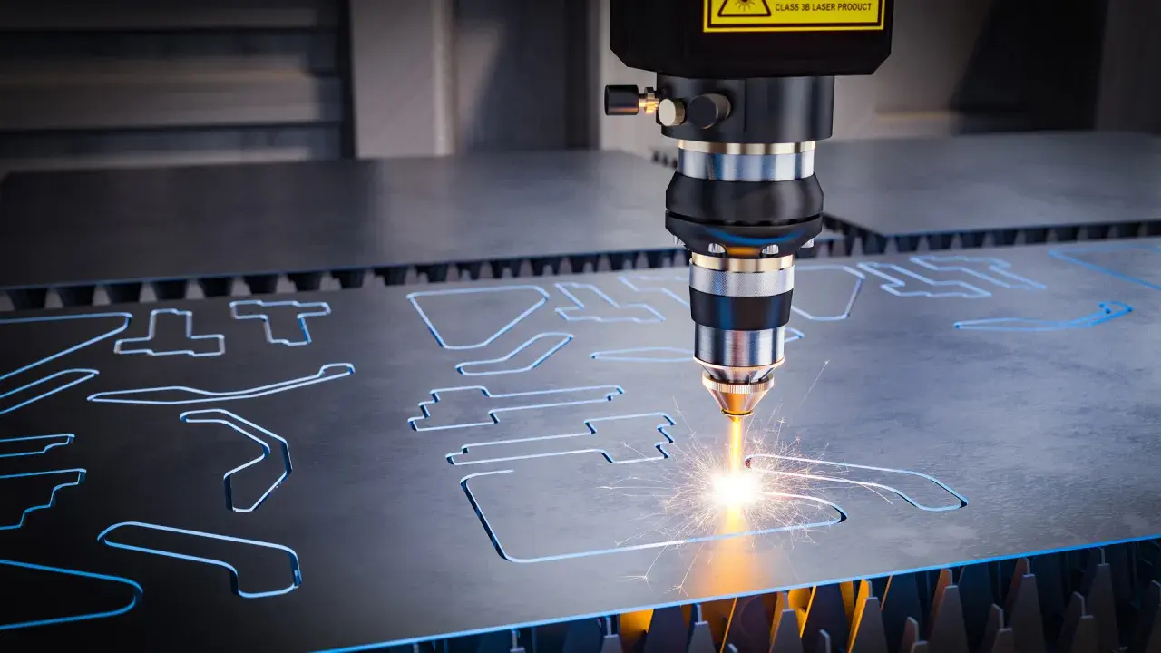 Macchina laser CNC che taglia metallo, creando forme precise. L'acronimo CNC sta per Controllo Numerico Computerizzato.