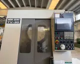 Macchina utensile Mori Seiki TV-30 con pannello di controllo e display.