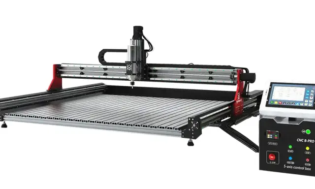 A CNC milling machine with a touch screen control box.