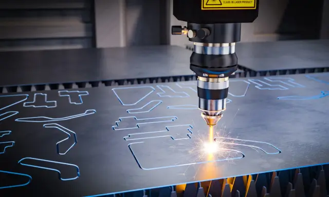 Macchina laser CNC che taglia metallo, creando forme precise. L'acronimo CNC sta per Controllo Numerico Computerizzato.
